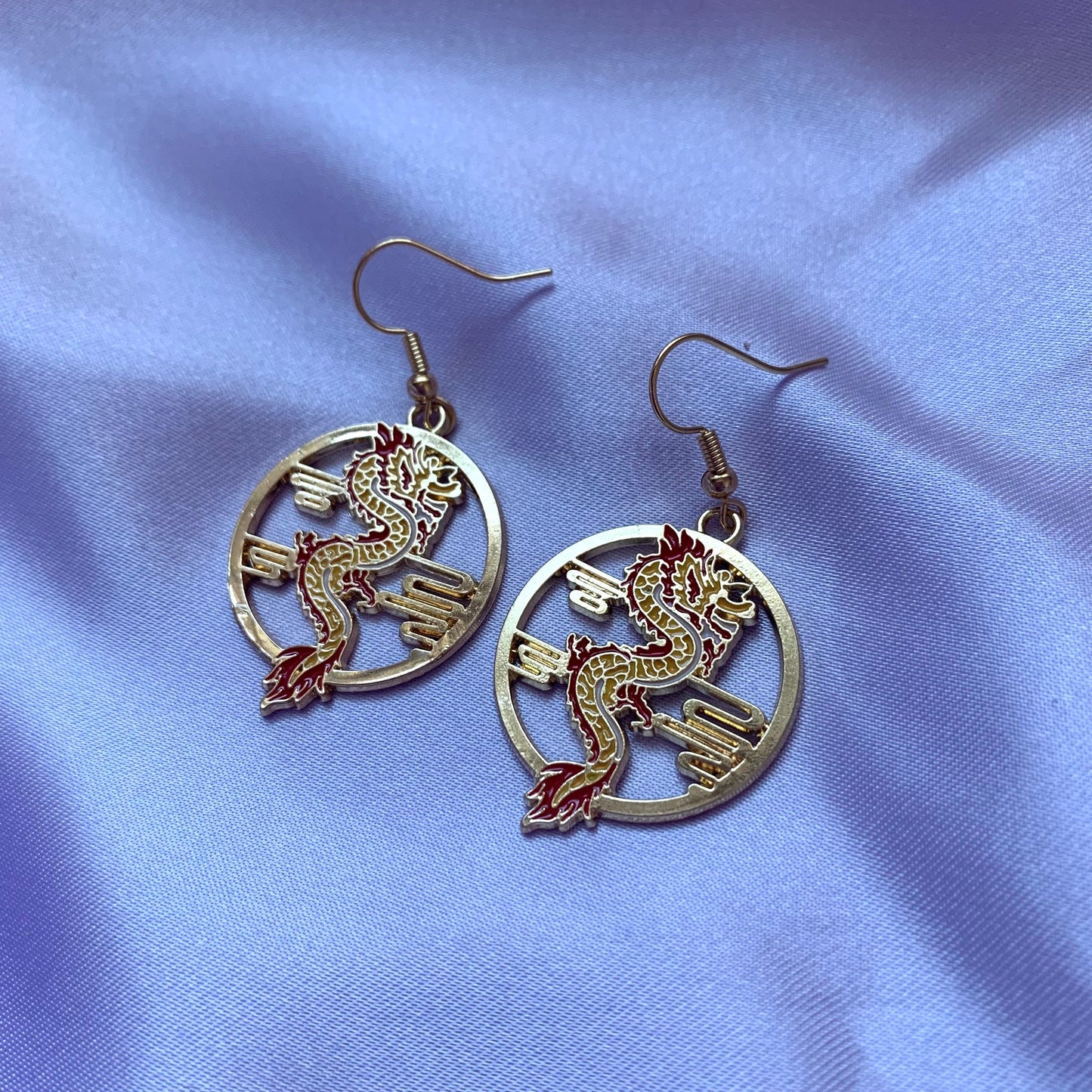 Red and yellow gold dragon dangle earrings