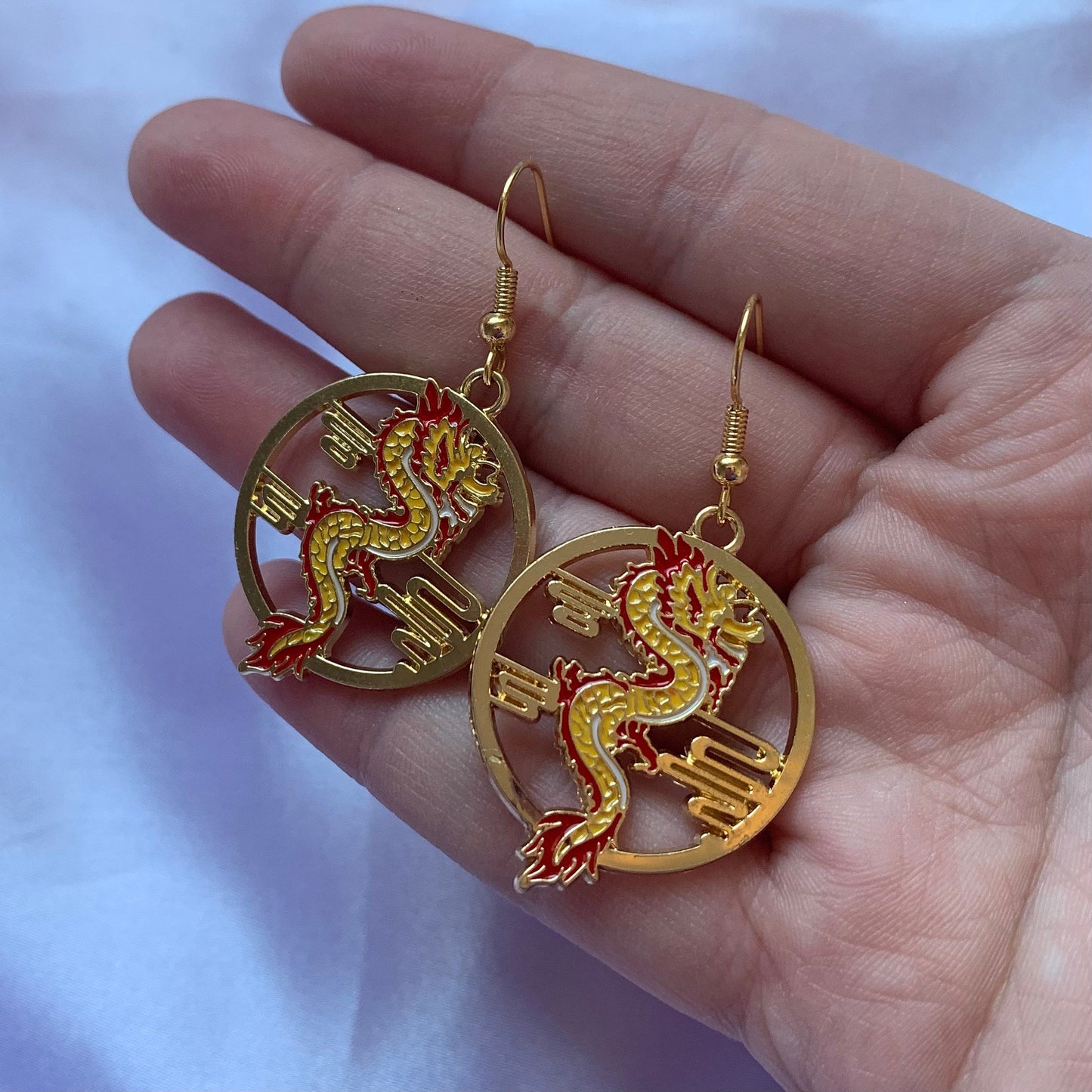 Red and yellow gold dragon dangle earrings