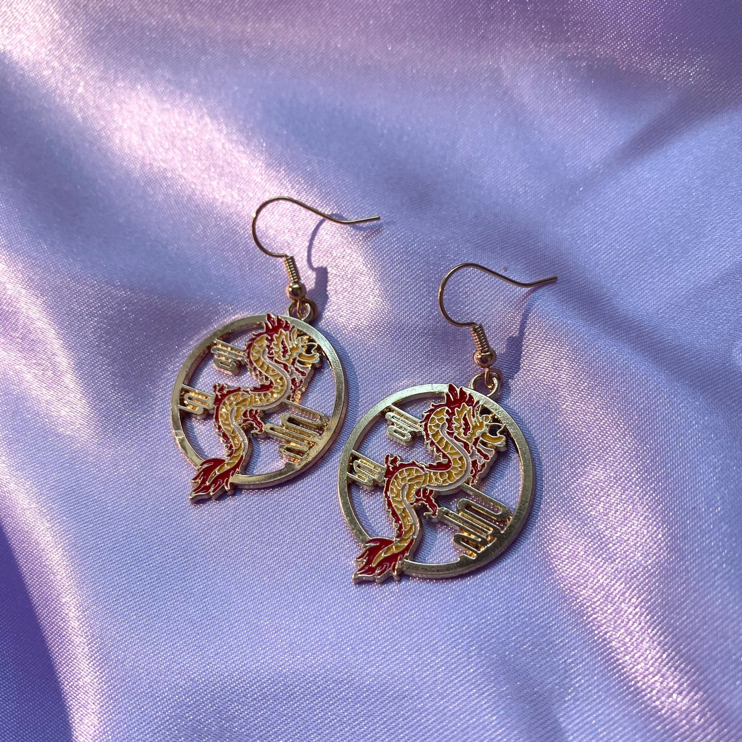 Red and yellow gold dragon dangle earrings