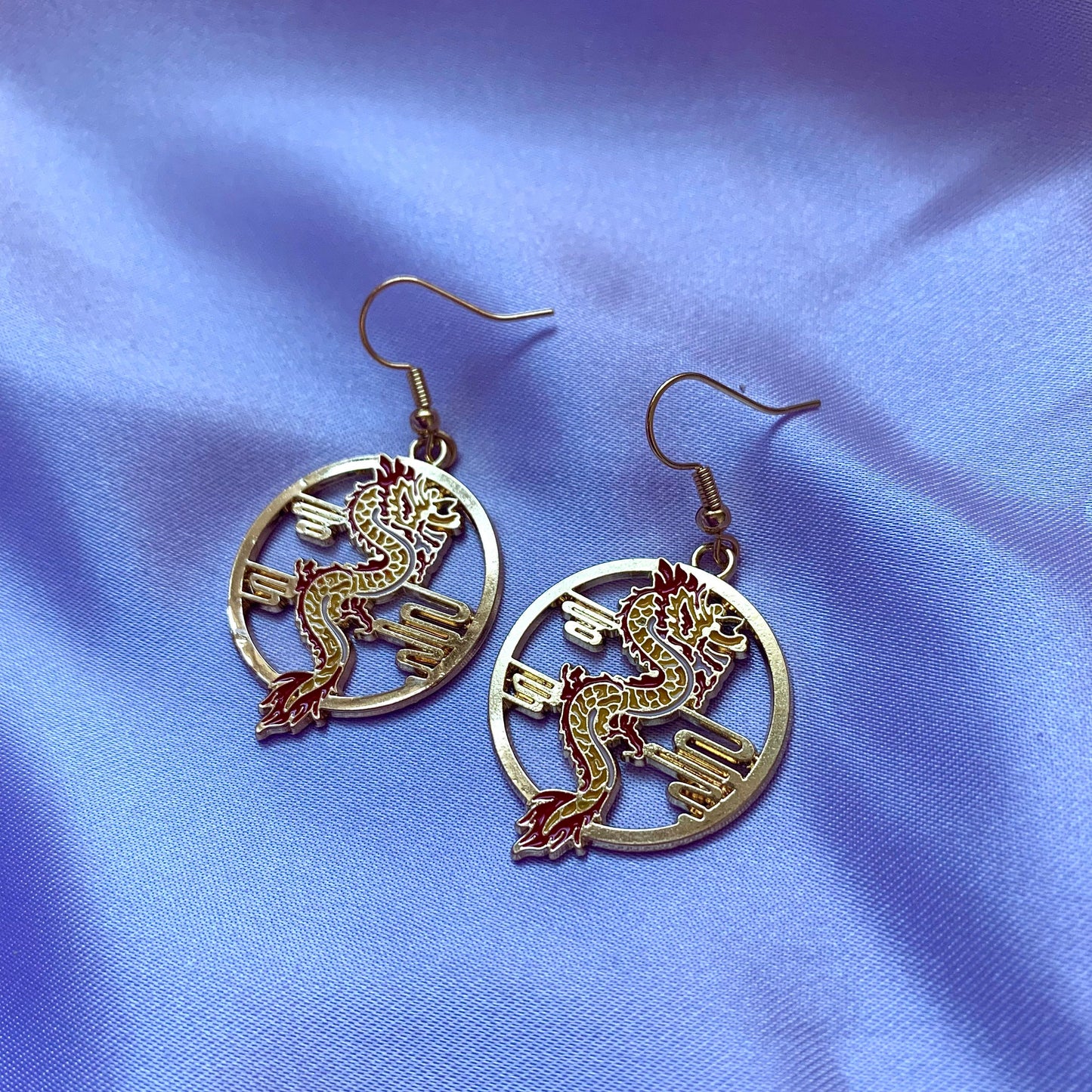 Red and yellow gold dragon dangle earrings