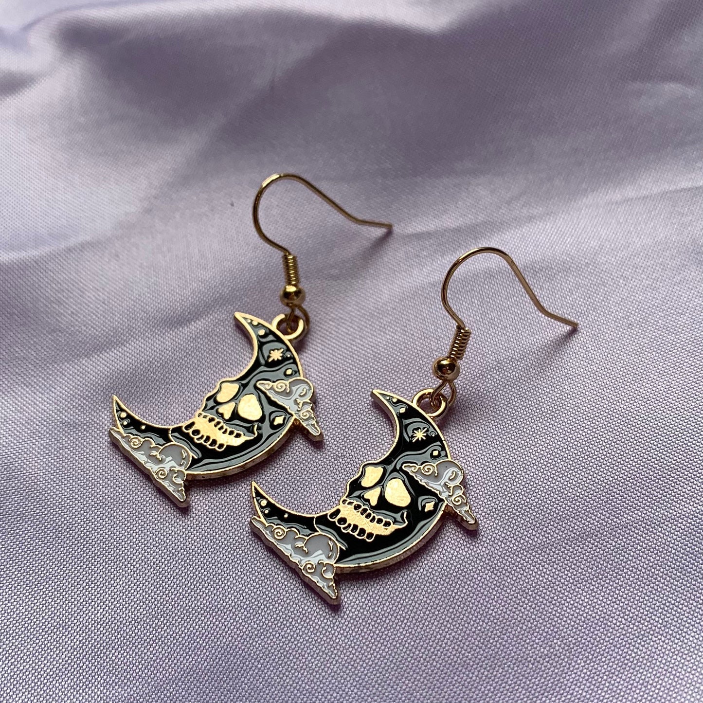 Black moon with skeleton face gold earrings