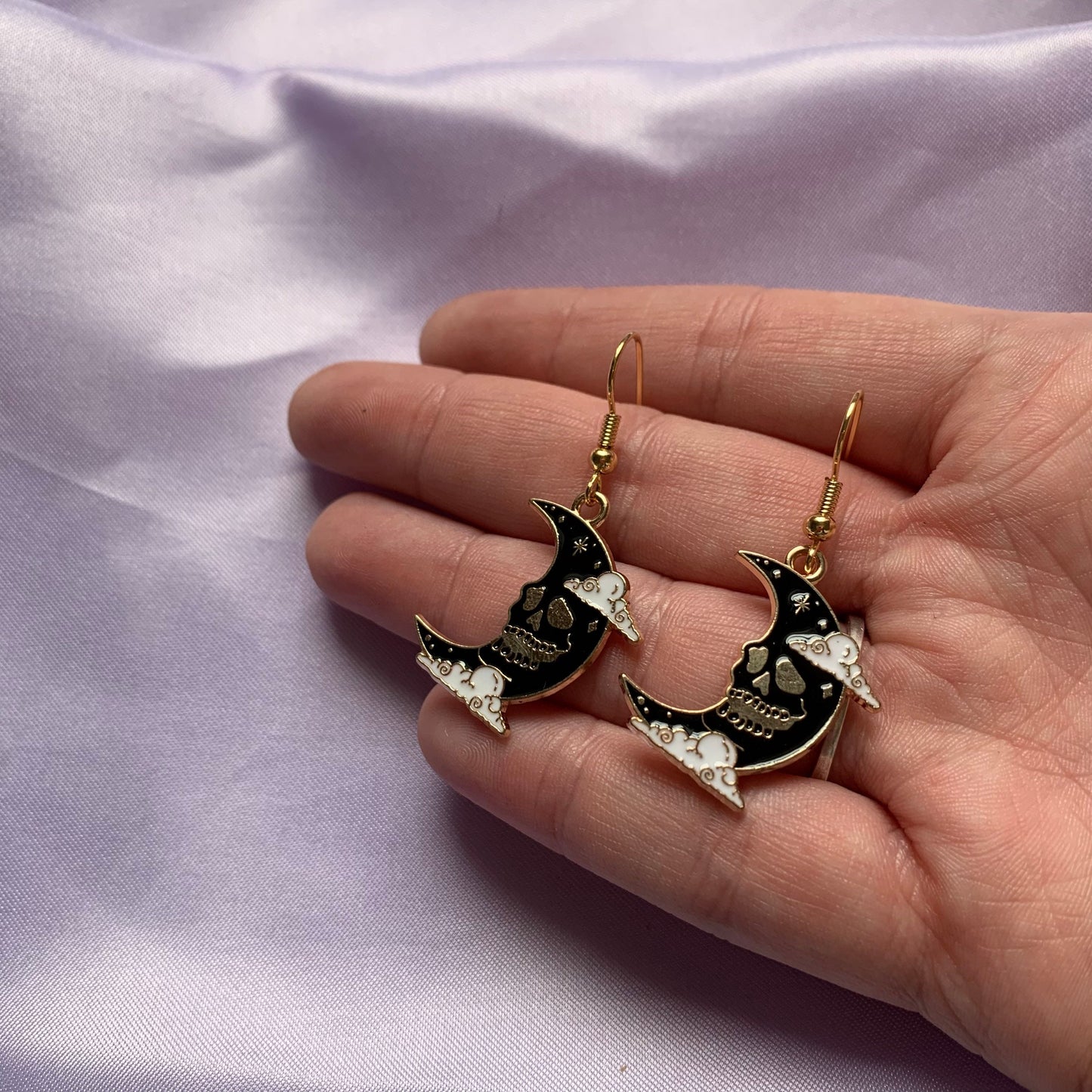 Black moon with skeleton face gold earrings