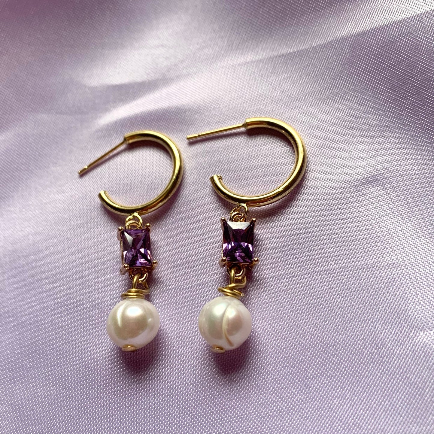 Gold plated freshwater pearl and rectangular purple half hoop stud earrings