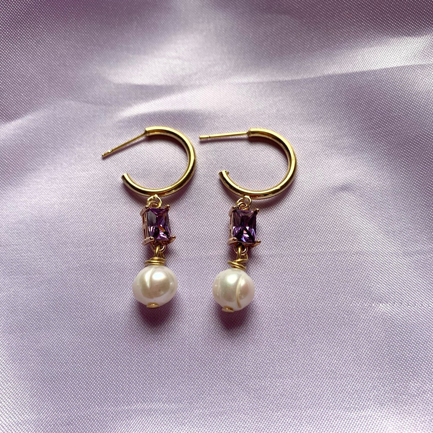 Gold plated freshwater pearl and rectangular purple half hoop stud earrings