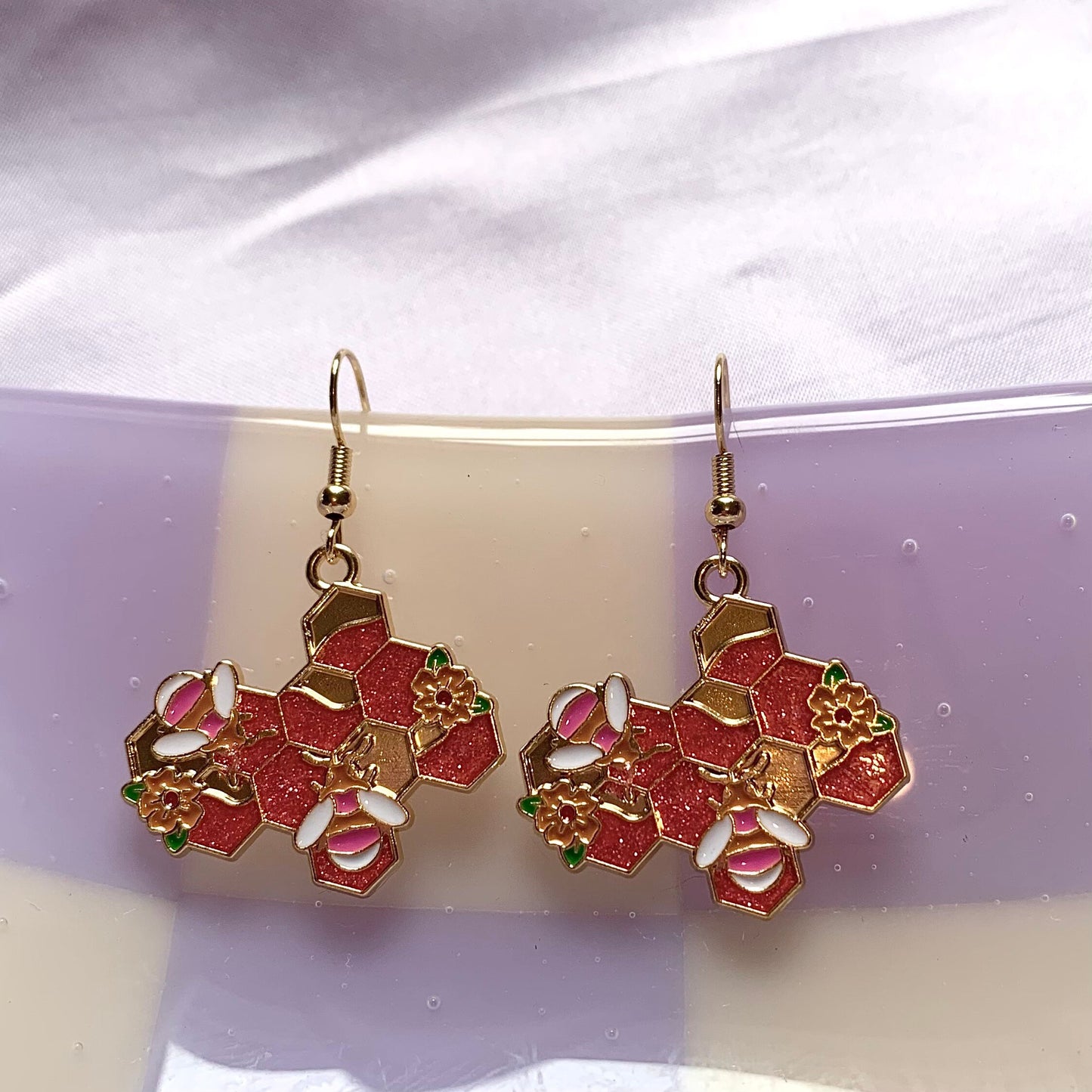 Pink glitter bumble bee and honey Comb gold earrings