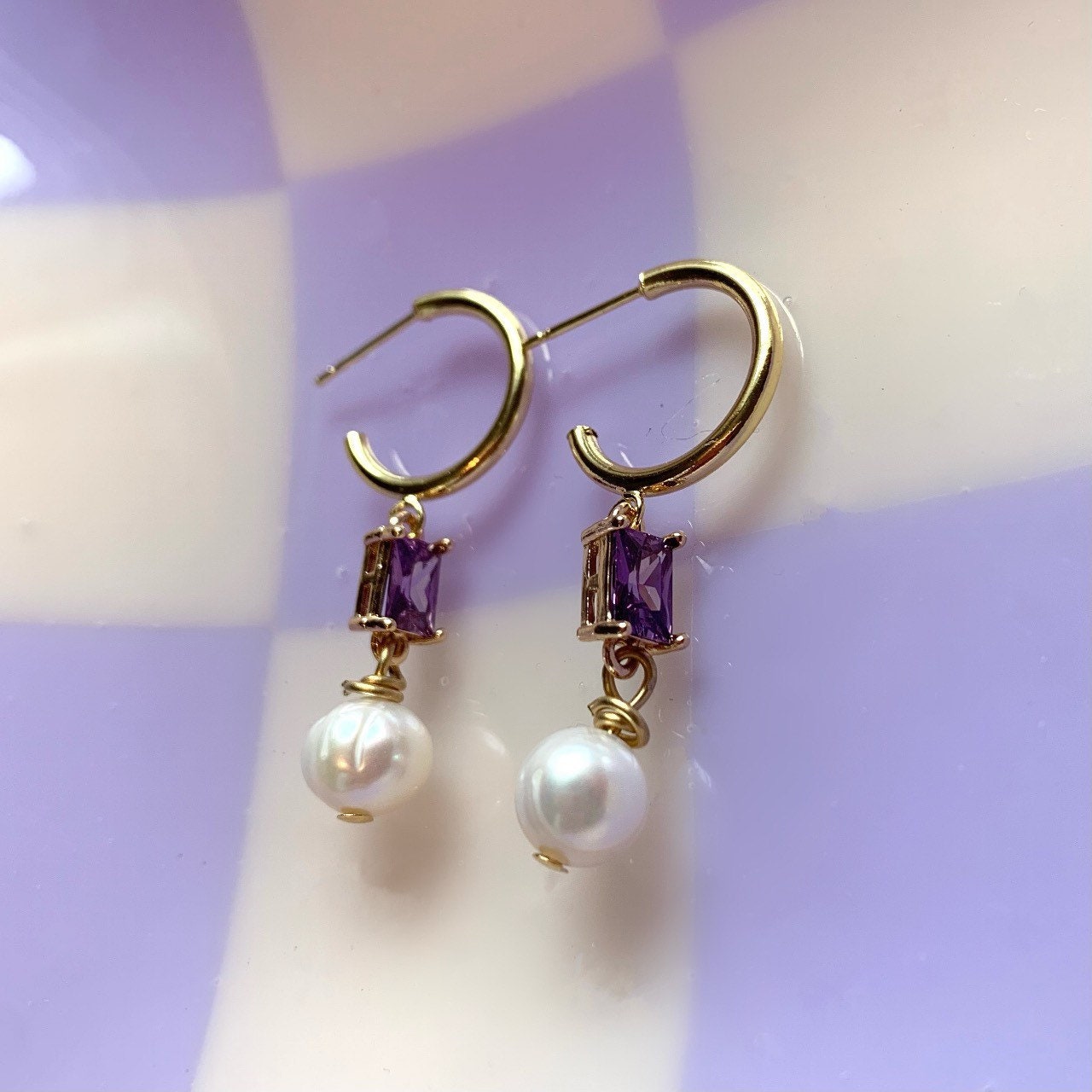 Gold plated freshwater pearl and rectangular purple half hoop stud earrings