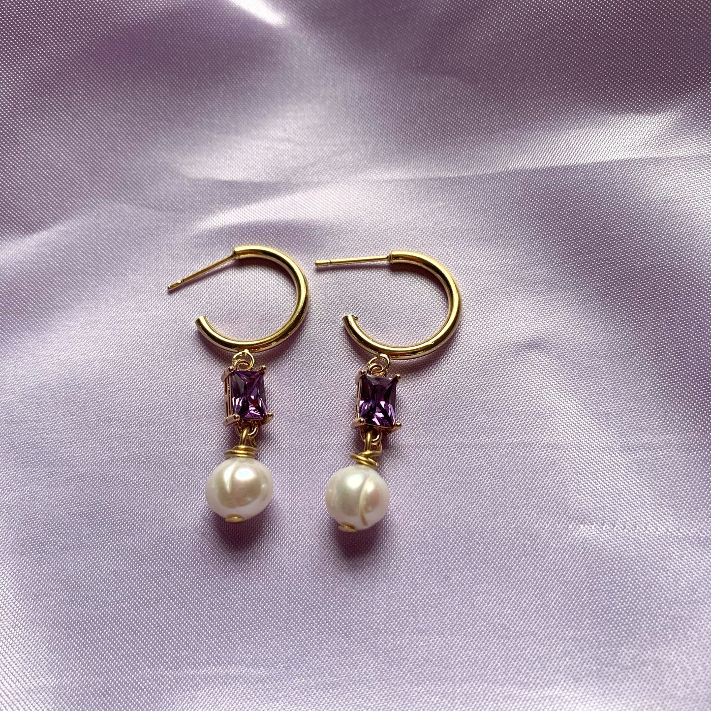 Gold plated freshwater pearl and rectangular purple half hoop stud earrings