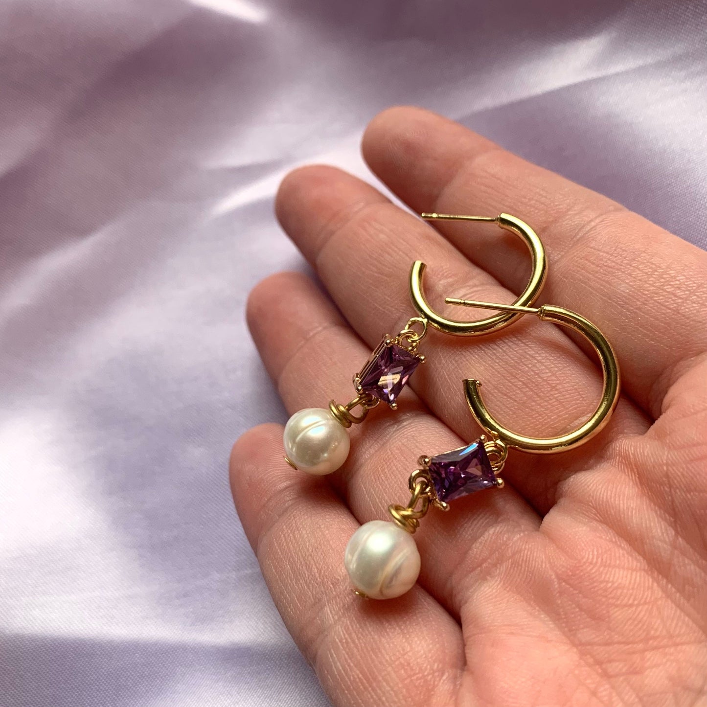 Gold plated freshwater pearl and rectangular purple half hoop stud earrings