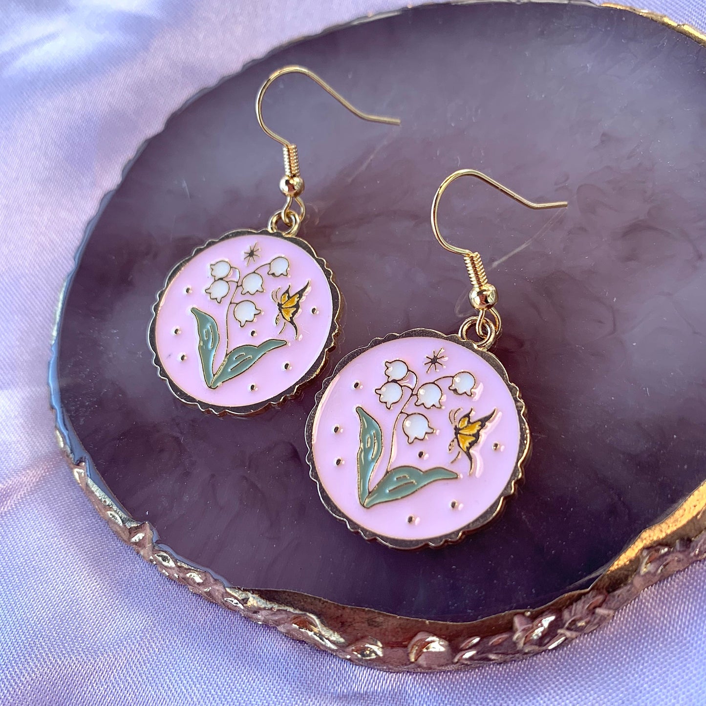 Pink circle with flowers and butterfly dangle gold earrings