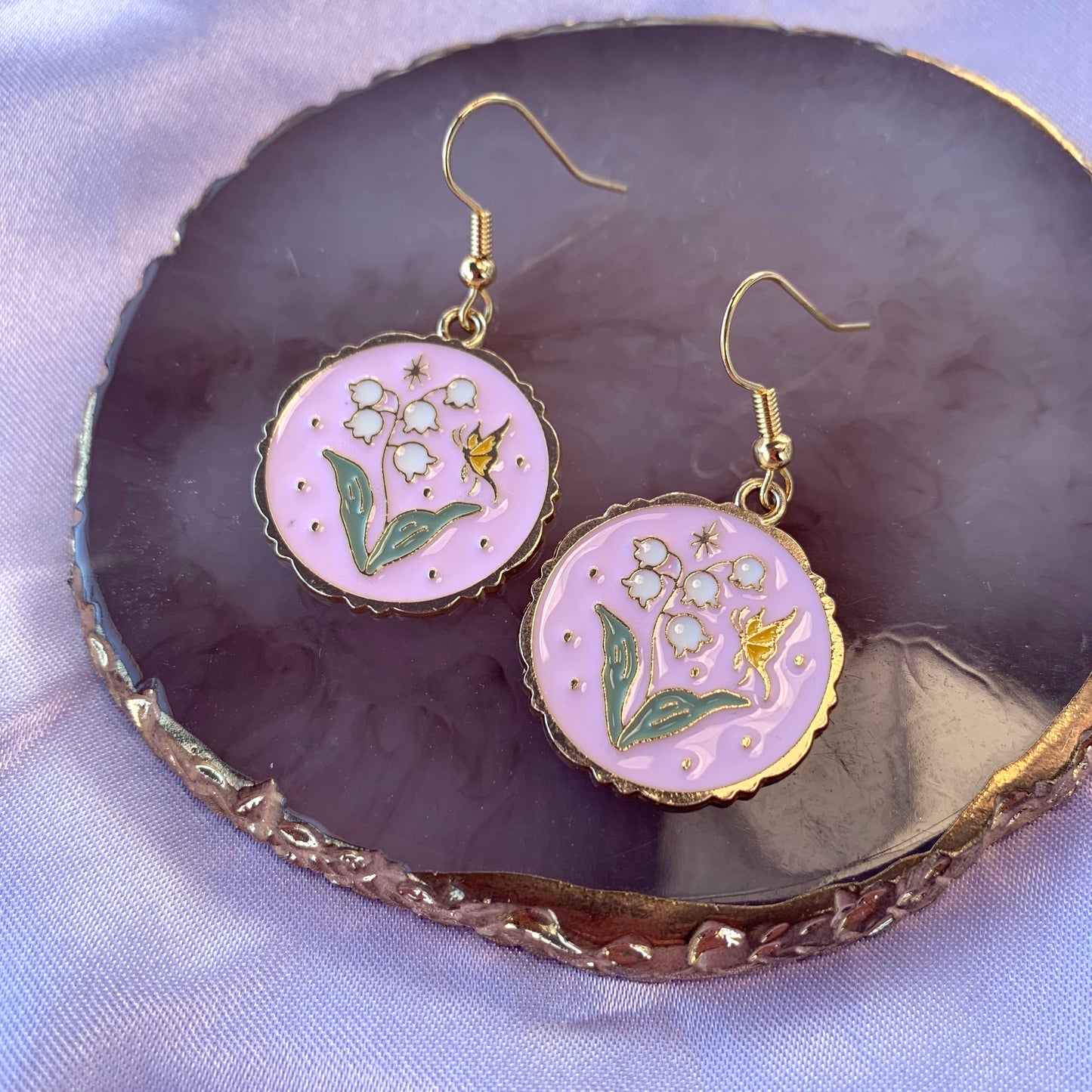 Pink circle with flowers and butterfly dangle gold earrings