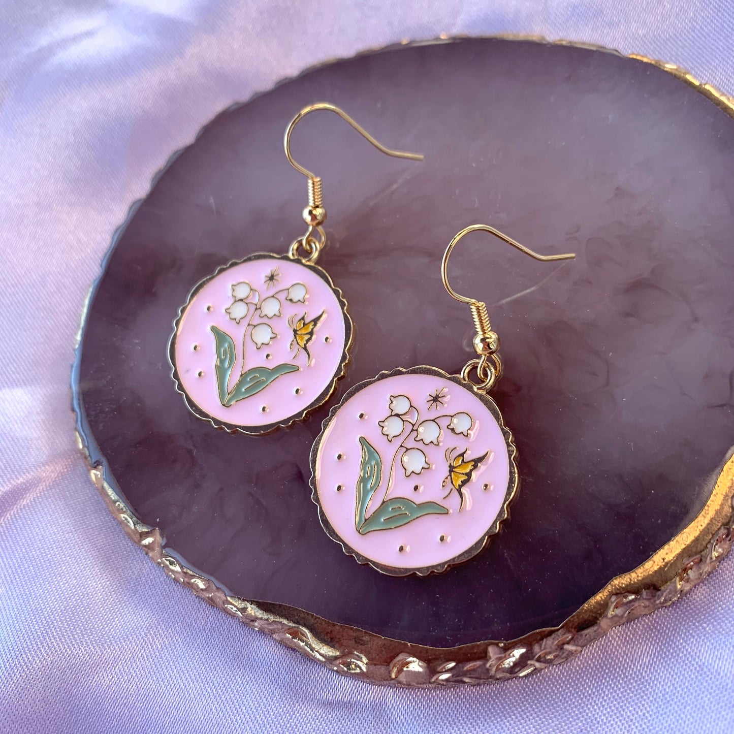 Pink circle with flowers and butterfly dangle gold earrings