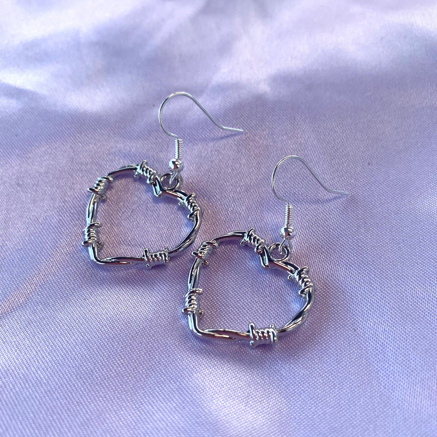 Silver or gold barb wire heart earrings