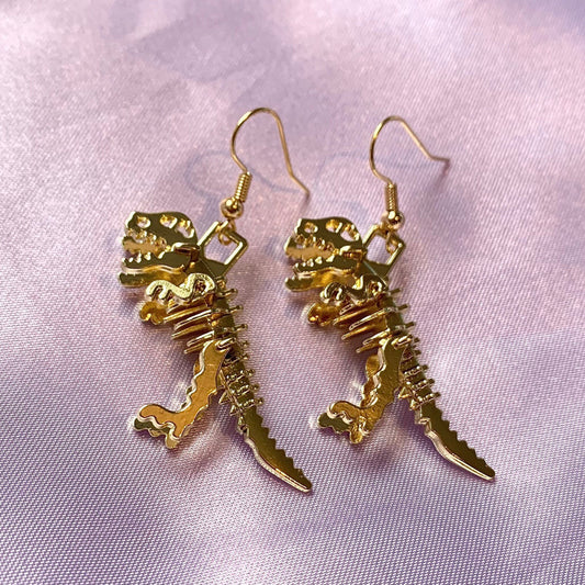 Gold dinosaur t-Rex skeleton earrings