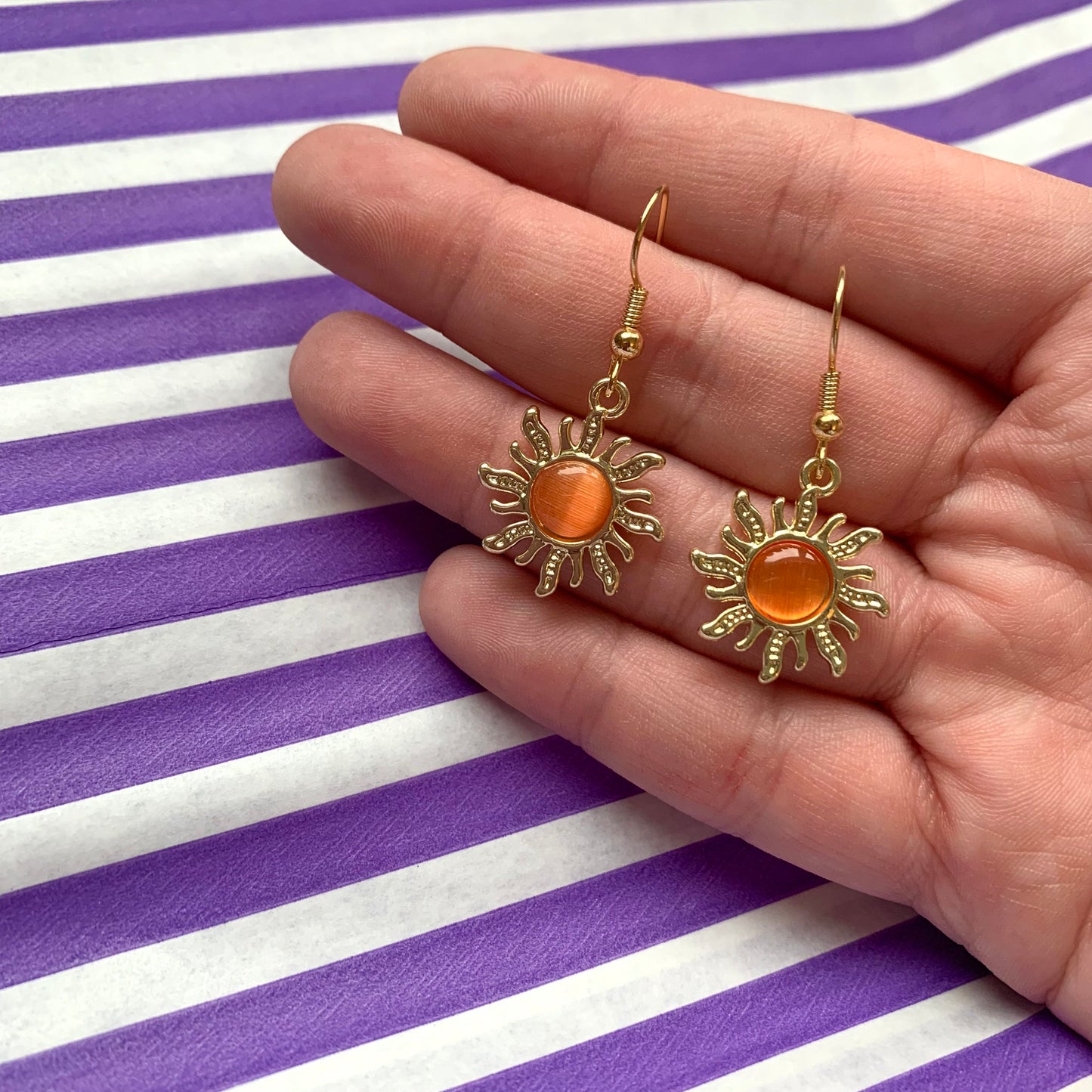 Gold orange sun earrings with orange centre dangle earrings