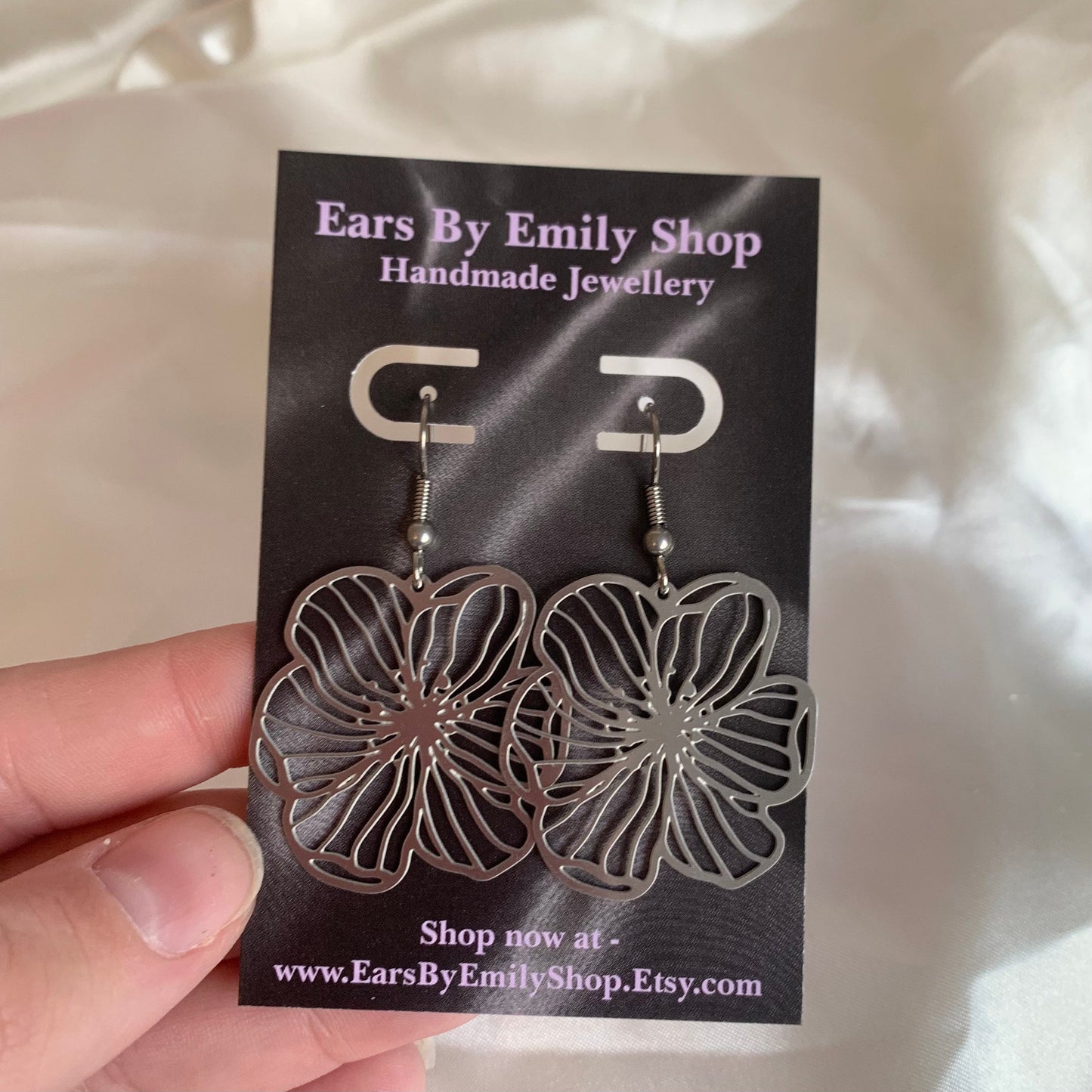 Stainless steel flower outline dangle earrings