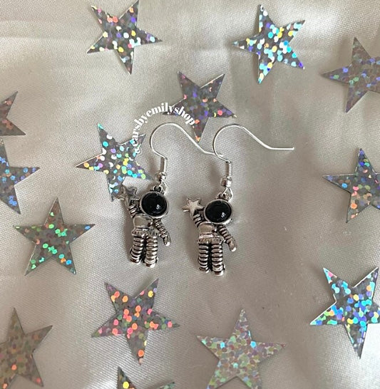 Silver astronaut space man science dangle earrings