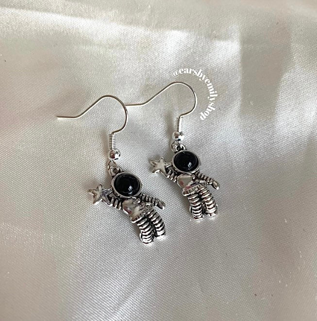 Silver astronaut space man science dangle earrings