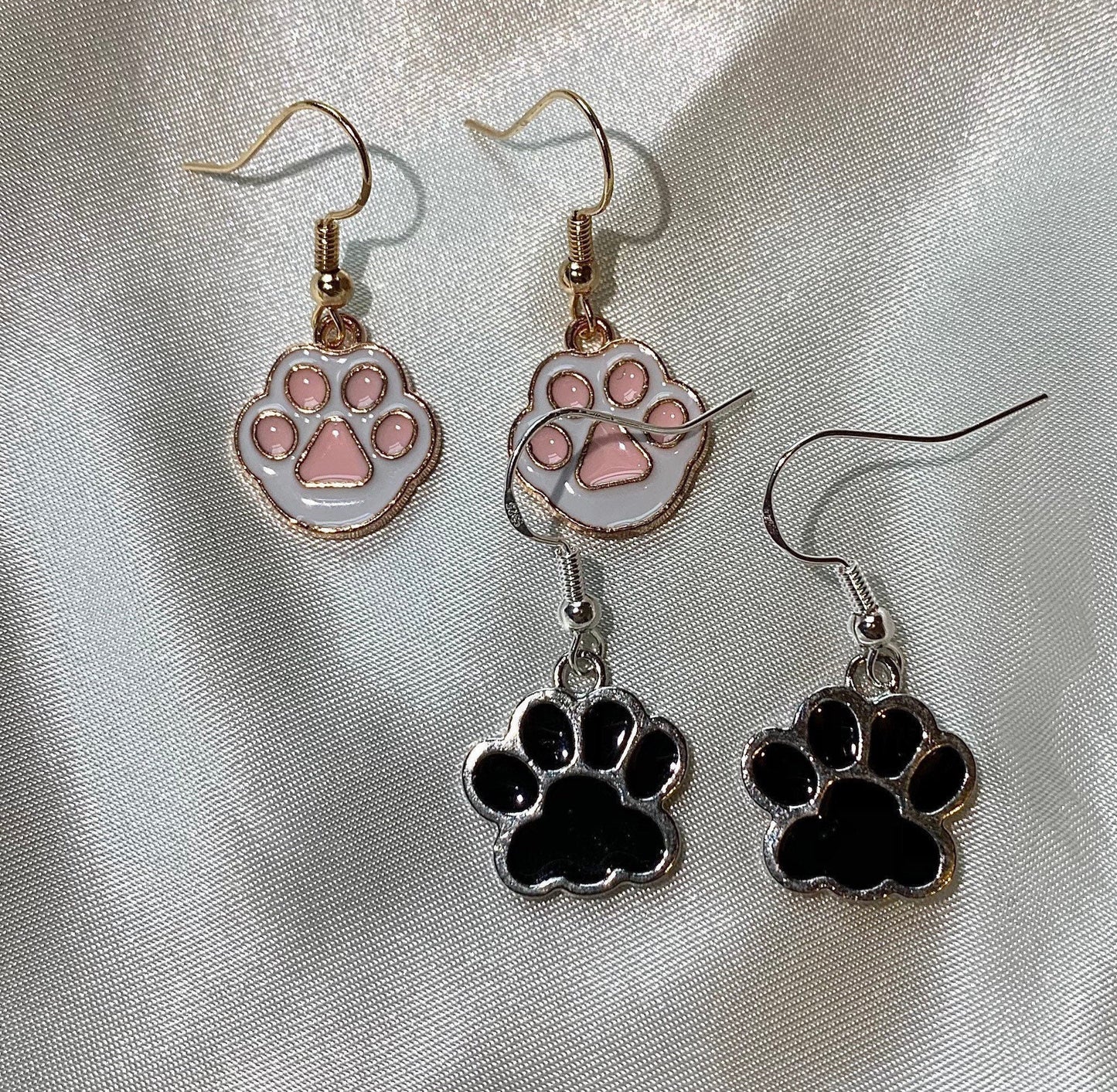 Paw print dangle earrings