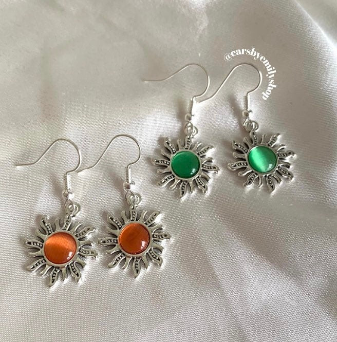 Silver orange or green centre feature sun drop dangle earrings