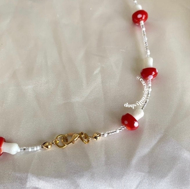 Red and white mushroom beaded necklace with gold