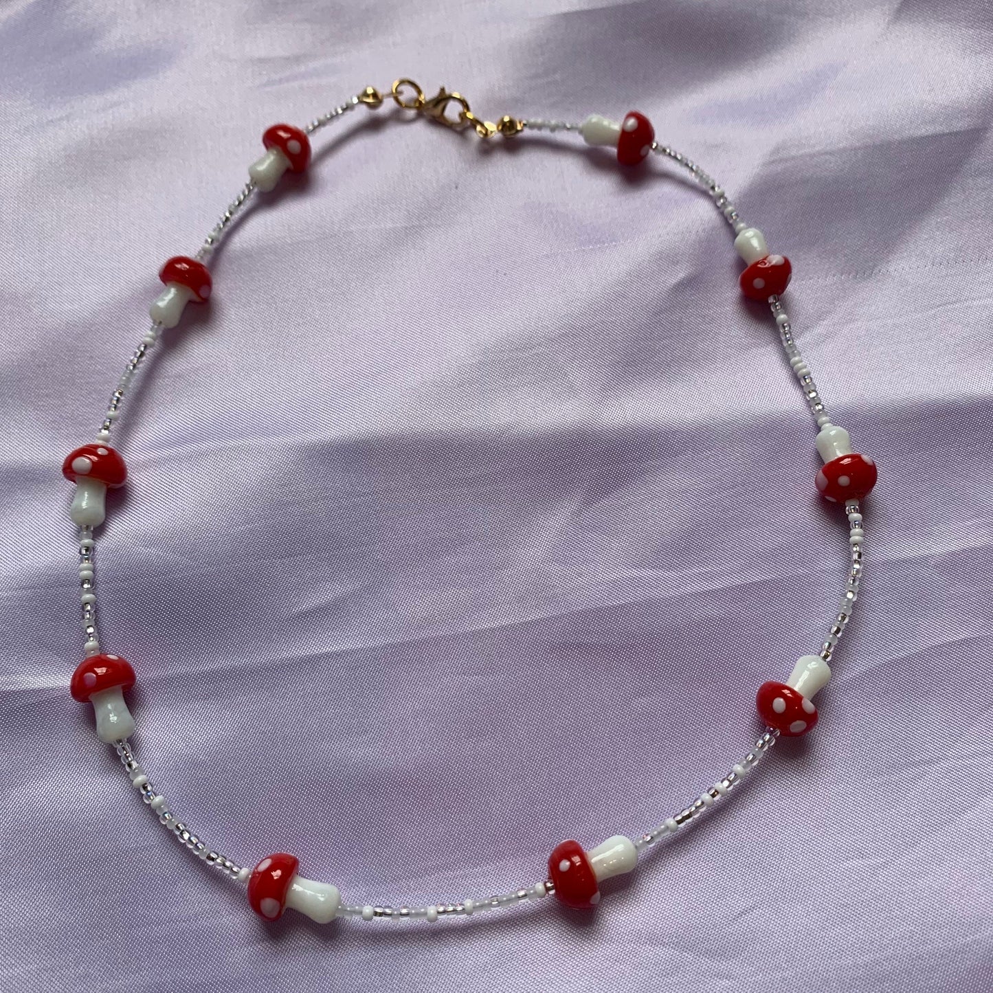 Red and white mushroom beaded necklace with gold