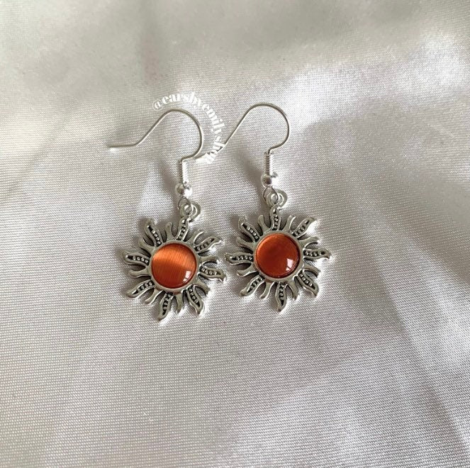 Silver orange or green centre feature sun drop dangle earrings