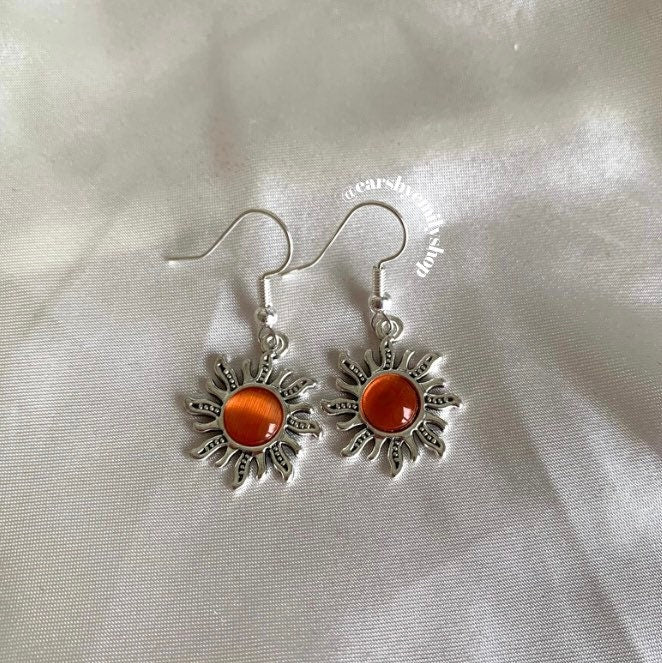 Silver orange or green centre feature sun drop dangle earrings