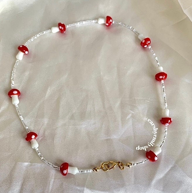 Red and white mushroom beaded necklace with gold