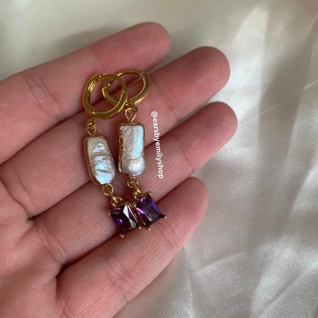 Gold plated purple crystal and pearl huggie hoop earrings