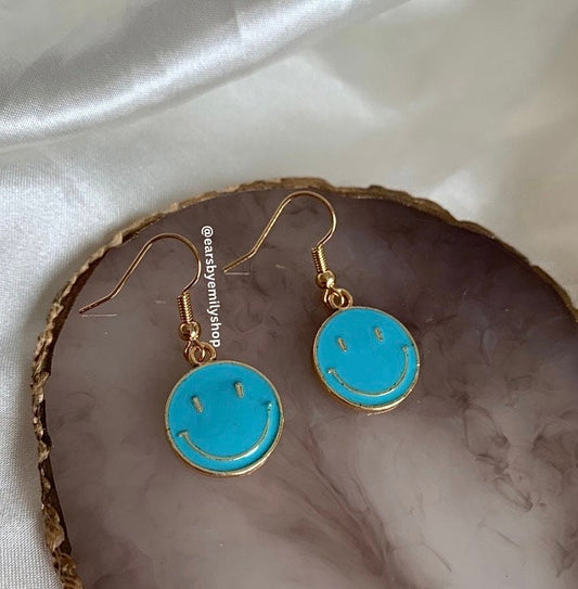 Blue smiley face dangle gold earrings