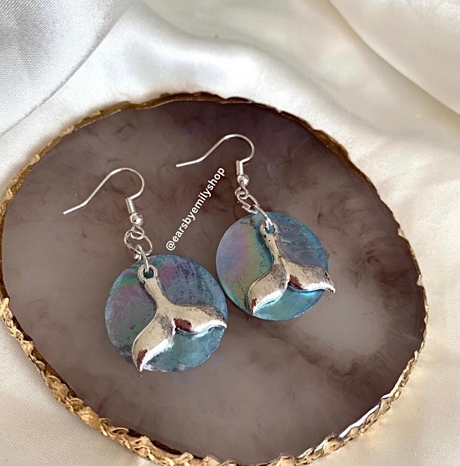 Cool quirky  beach inspired blue sea shell disc with dolphin tail on silver plated hooks