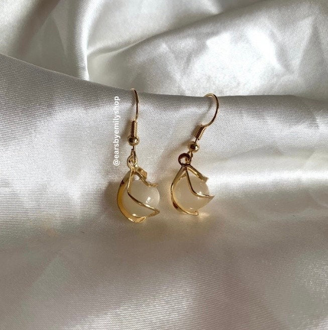 Gold plated white sphere  gold spiral earrings