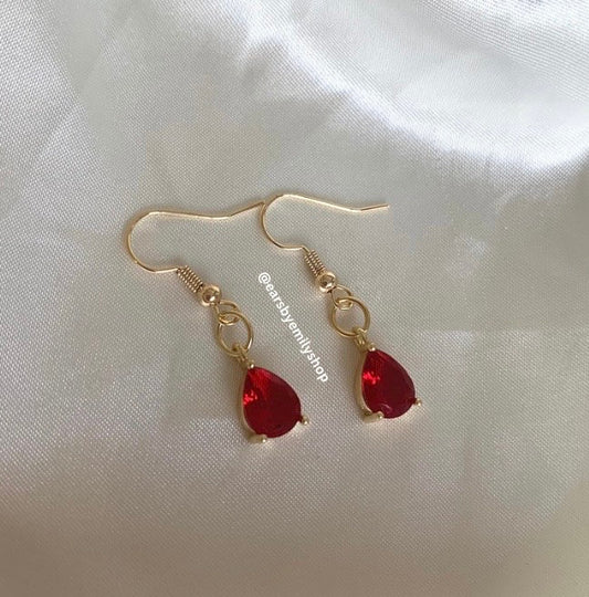 Red teardrop gem gold plated dangle earrings