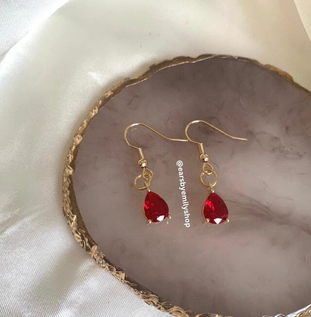 Red teardrop gem gold plated dangle earrings