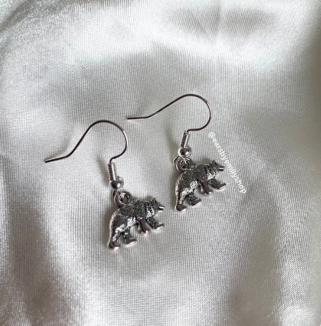 Silver bear dangle earrings