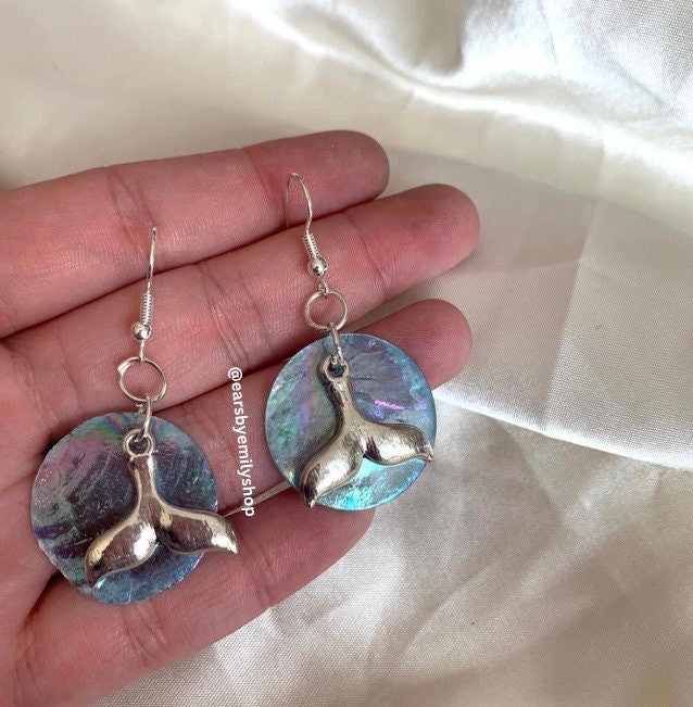 Cool quirky  beach inspired blue sea shell disc with dolphin tail on silver plated hooks