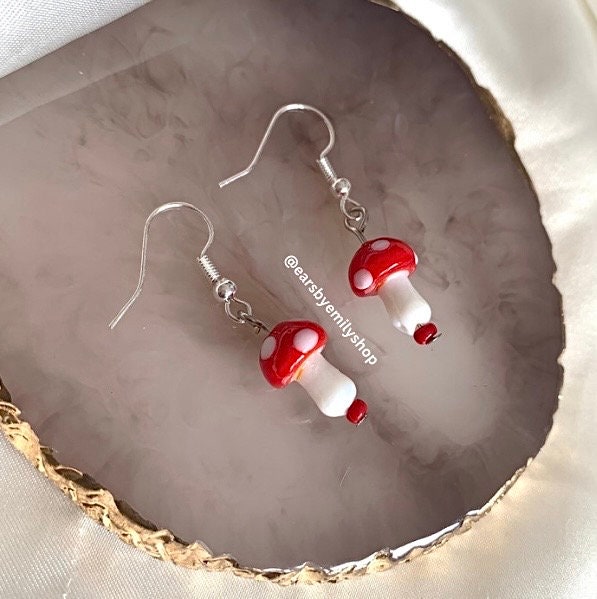 Cool quirky red and white glass lamp work drop dangle earrings on silver plated hooks.