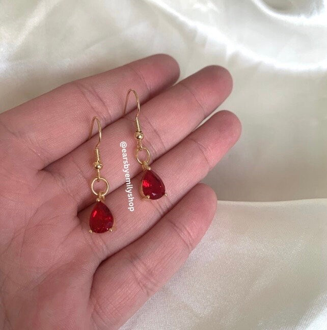 Red teardrop gem gold plated dangle earrings