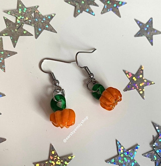 Orange glass lampwork pumpkin dangle Halloween surgical steel earrings